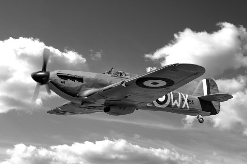 WW2 RAF Hawker Hurricane fighter plane over the skies of Kent, UK