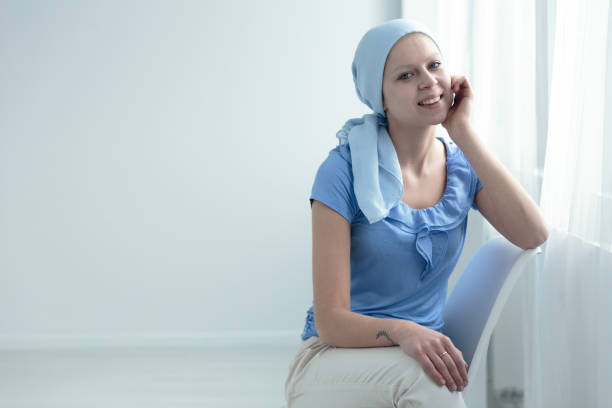 istock Sick woman smiling with hope 694105324
