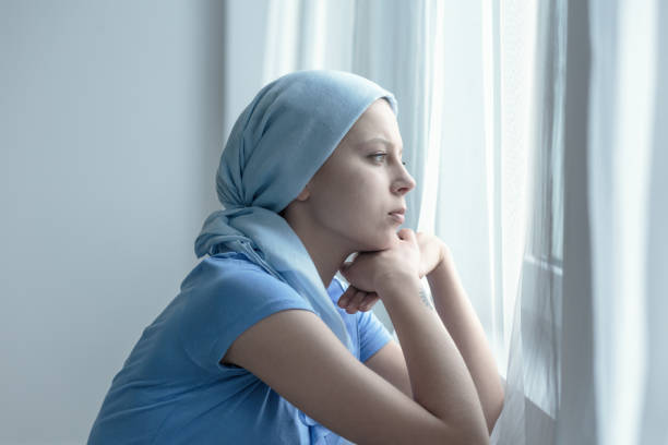 istock Woman after radiation therapy 694105336