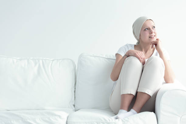 istock Woman with cancer smiling 694105344