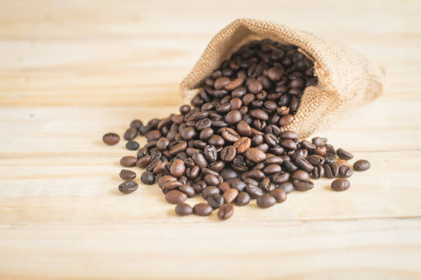 istock Studio Shot of Coffee Beans in a Bag 694112878