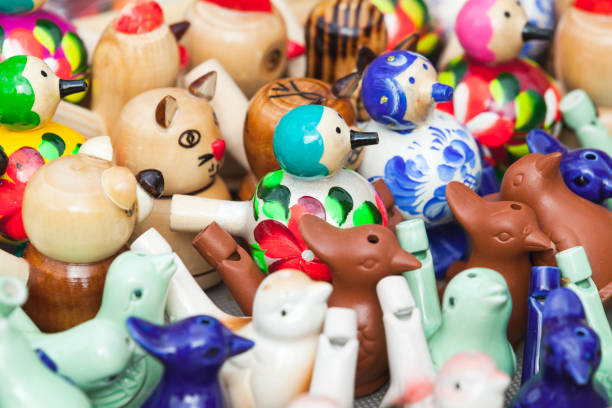 Traditional colorful russian whistles in shape of birds and animals