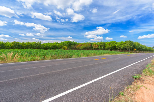 istock Asphalt road and countryside views 694128662