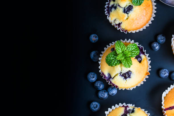 cupcakes with blueberries on the Board