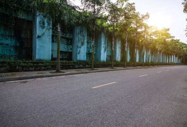 istock The beautiful road is surrounded by greenery 694131840