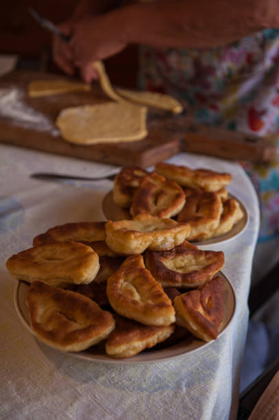 istock Grandmother bakes pies 694146524