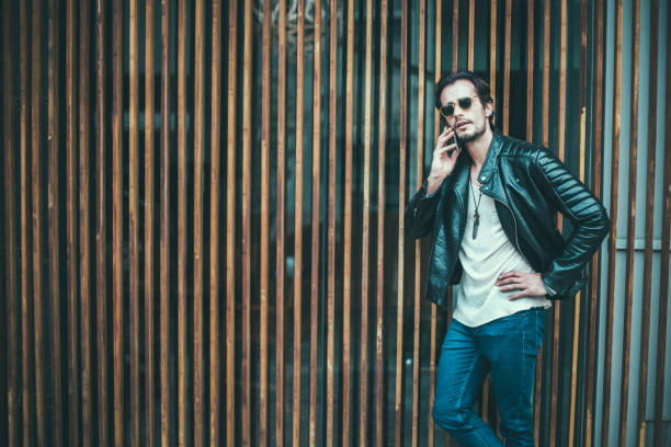 istock Attractive man on the phone 694149360
