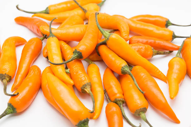 istock yellow chili pepper isolated on a white background 694156442