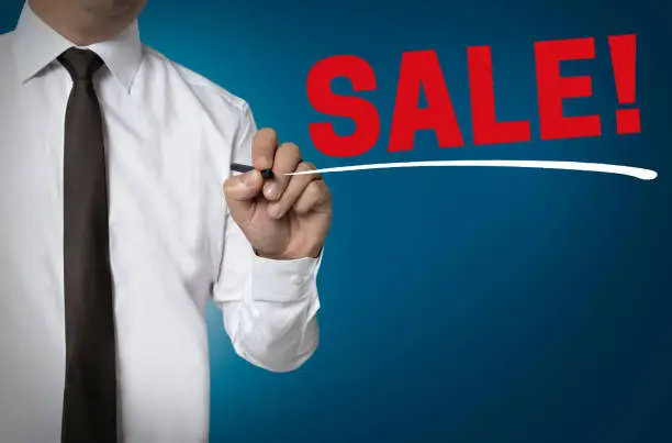 Sale is written by businessman background.