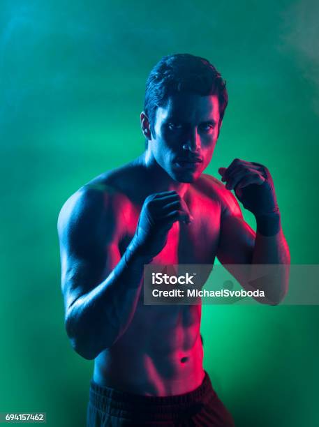 Smokey Surreal Light On A Mixed Martial Arts Fighter Stock Photo - Download Image Now