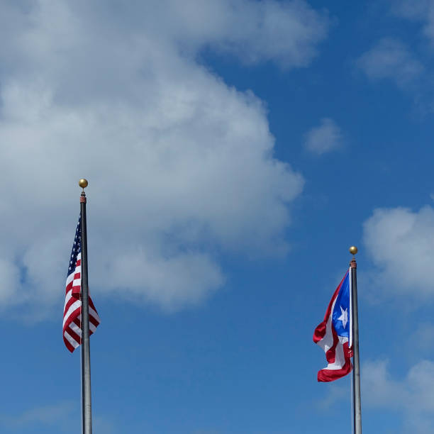 istock US and Puerto Rican Flags 694163334