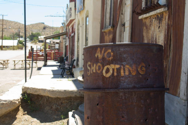 istock No shooting sign on barrel 694164142