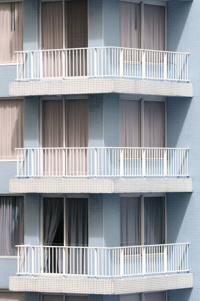 istock apartment building with terrace 694167494