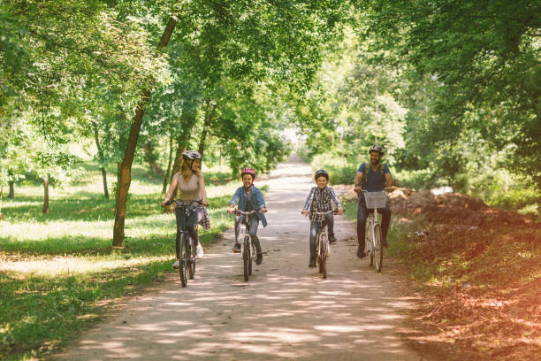 istock Family riding bicycle 694171196