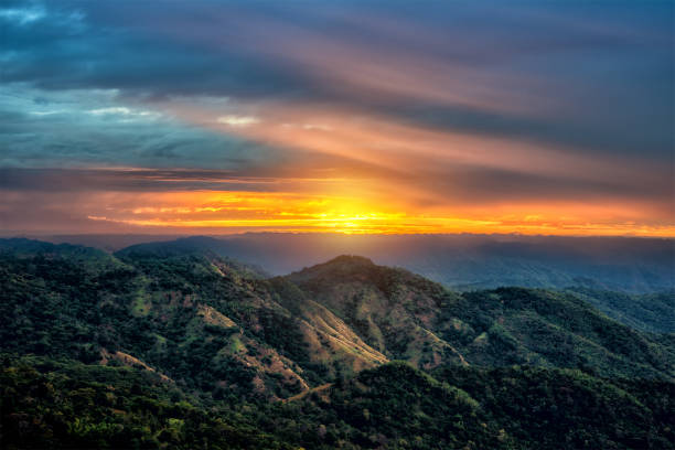 istock Dramatic Sunrise Twilight Sky on Mountain Landscape View in Summer 694171200