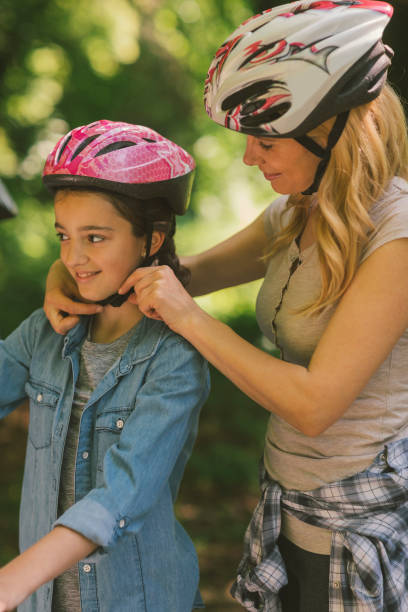 istock Family riding bicycle 694171278