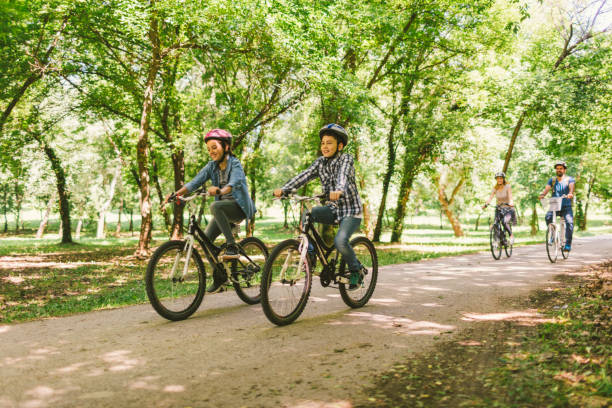 istock Family riding bicycle 694176878
