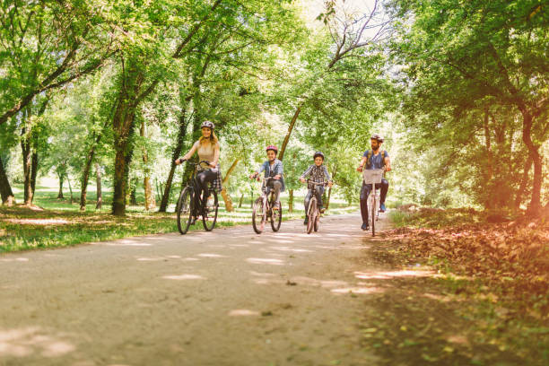 istock Family riding bicycle 694177112