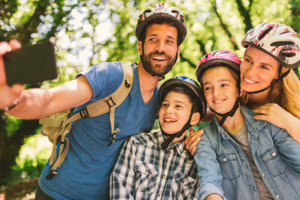 istock Family riding bicycle 694177662