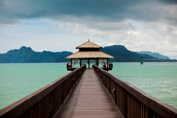 istock jetty with wooden house 694180270