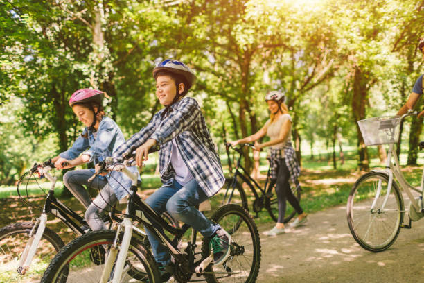 istock Family riding bicycle 694180618