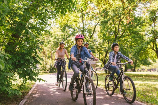 istock Family riding bicycle 694181232