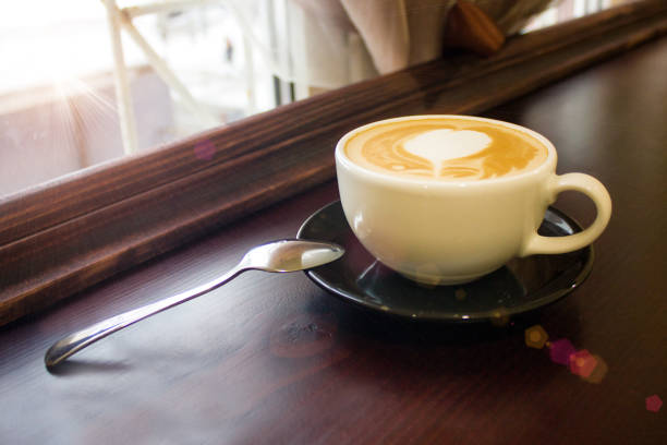 istock Cup of hot coffe on the table 694181574