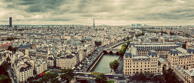 Paris, France panorama with Eiffel Tower, Seine river and bridges. As seen from Notre Dame. Vintage