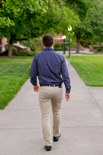 istock College Grad on Campus in Oregon 694198458