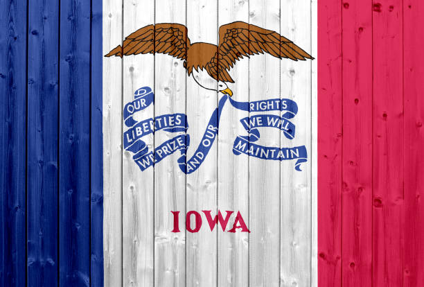istock Iowa flag with wood texture 694202010