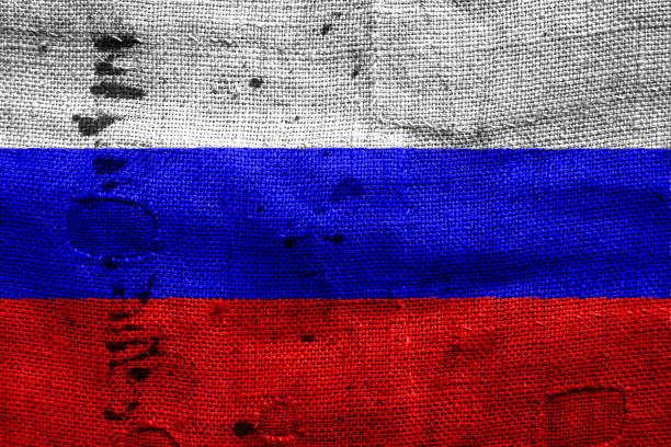 istock Russia flag with grunge fabric texture 694202394