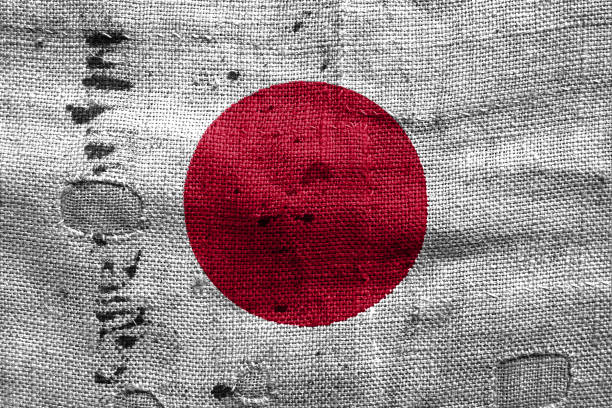 istock Japan flag with grunge fabric texture 694202412