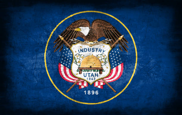 istock Utah flag with grunge metal texture 694203060