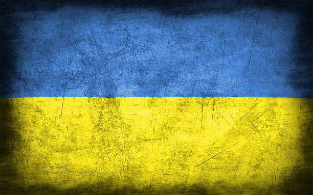 istock Ukraine flag with grunge metal texture 694204816