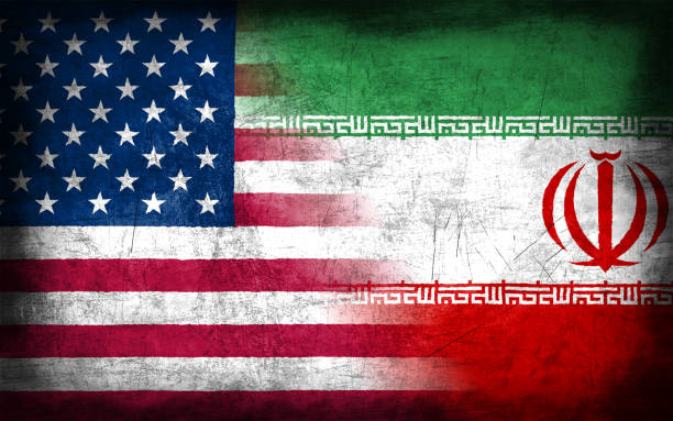 istock USA and Iran flag with grunge metal texture 694205202
