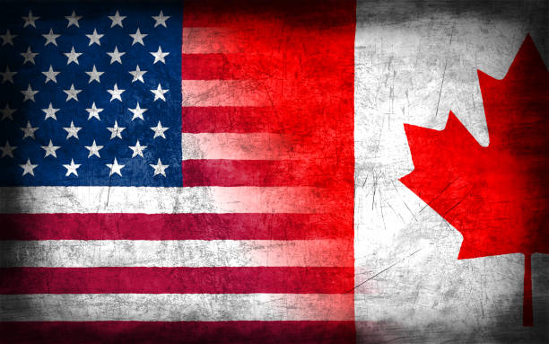 istock USA and Canada flag with grunge metal texture 694205206