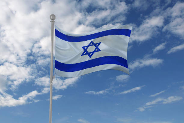 istock Israel flag waving in the sky 694207926