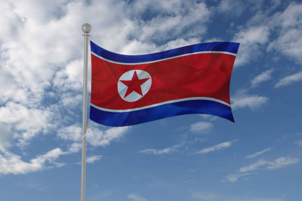 istock North Korea flag waving in the sky 694208014