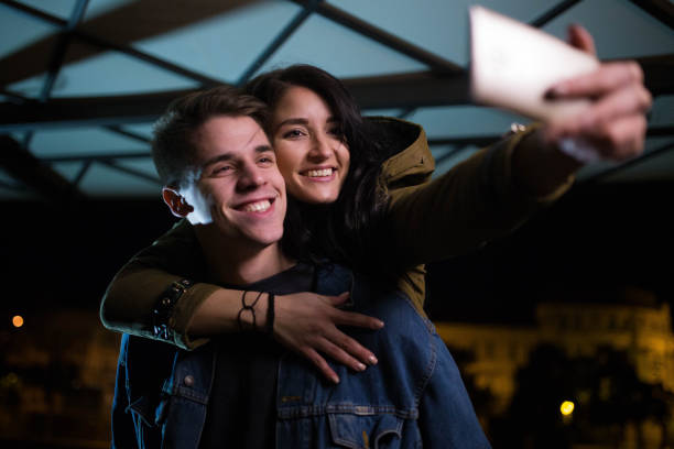 istock Couple making selfie photo 694208348