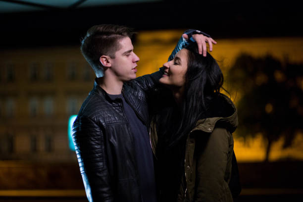 istock Young playful beautiful couple 694208440