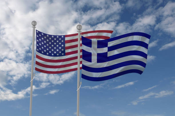 istock USA and Greece flag waving in the sky 694209200