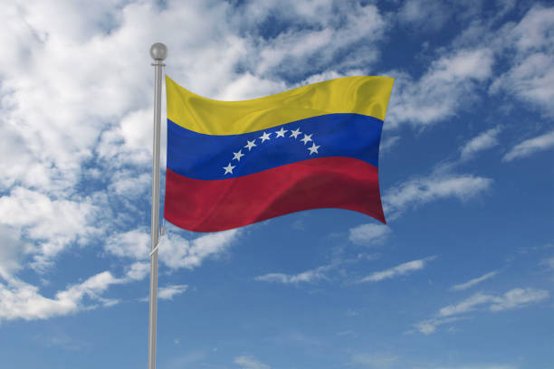 istock Venezuela flag waving in the sky 694209328