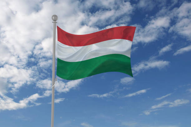 istock Hungary flag waving in the sky 694209542