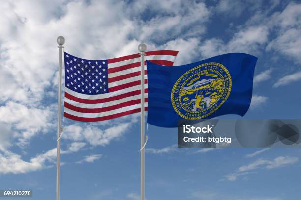 Usa And Nebraska Flag Waving In The Sky Stock Photo - Download Image Now - American Flag, Asia, Authority