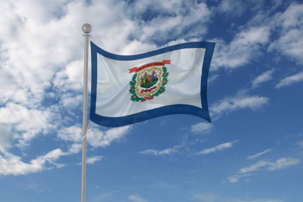 istock West Virginia flag waving in the sky 694210432