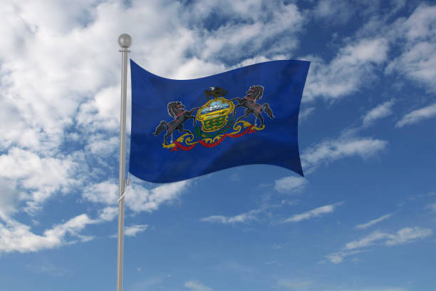 istock Pennsylvania flag waving in the sky 694212082