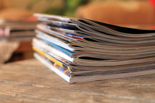 istock Magazines on the wooden table 694213350