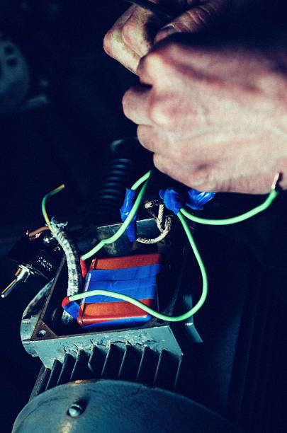 istock Repair of machine tools. Worker hands in workshop 694213948