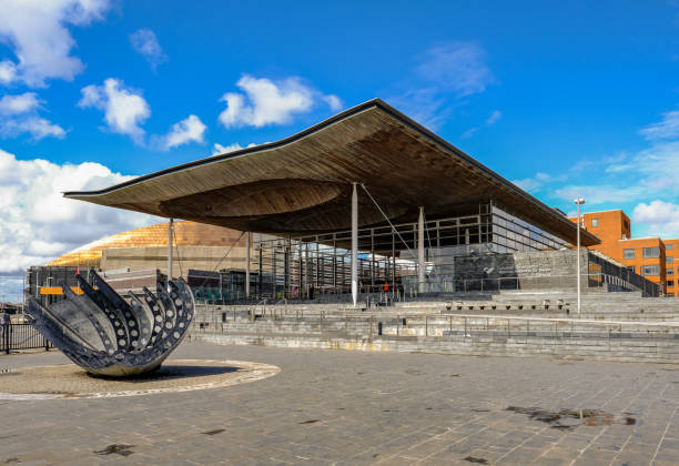 Cardiff Bay, Wales - May 20, 2017: National Assembly building Sinedd, National Assembly building.  Front view with sculpture in the foreground. national assembly for wales stock pictures, royalty-free photos & images