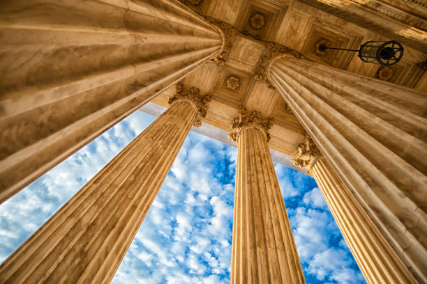 Supreme Court Columns Columns at the entrance to the U.S. Supreme Court geometrical architecture stock pictures, royalty-free photos & images